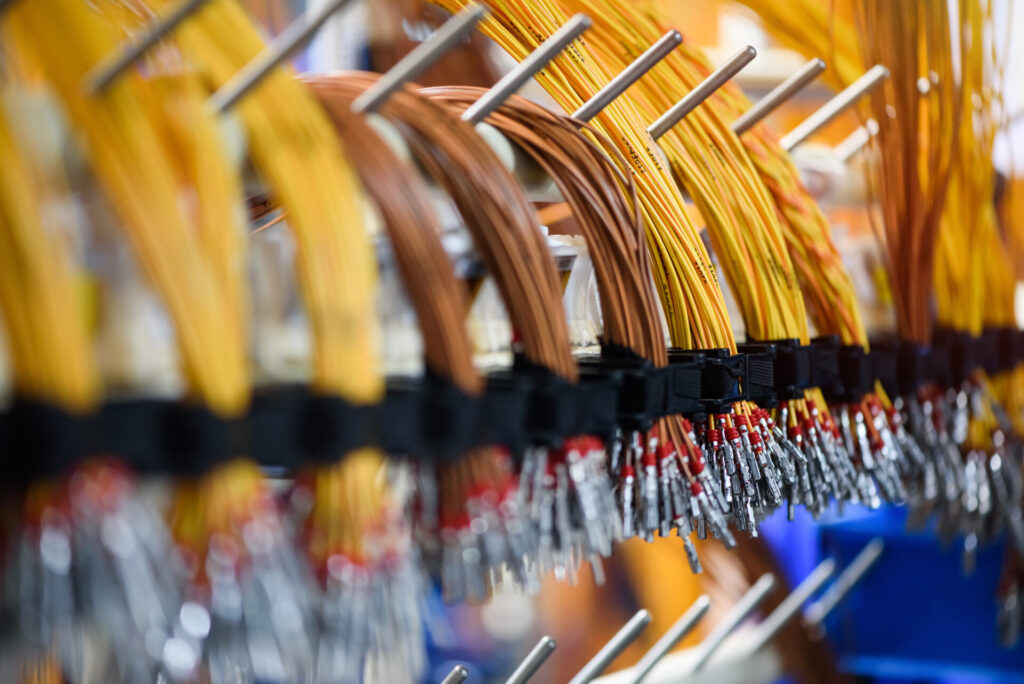 Wire harnesses lined up in a row.