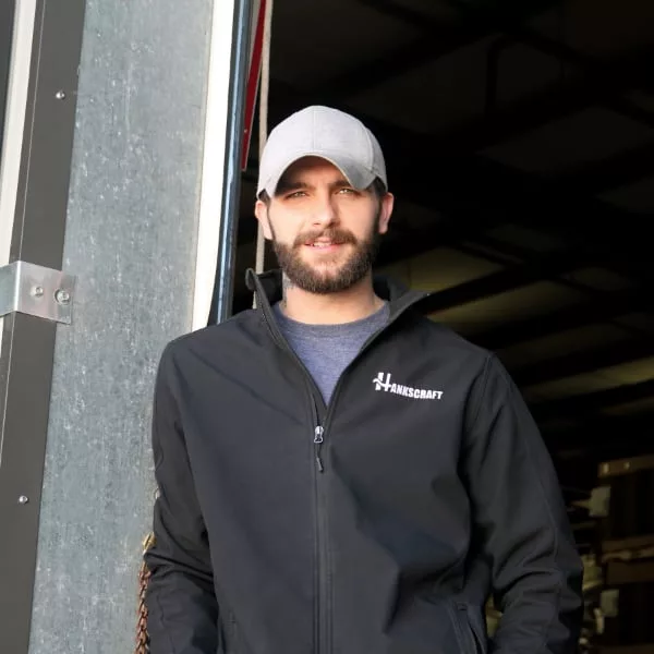 Shipping and logistics manager in the shipping and receiving bay.